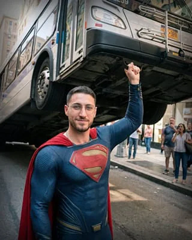 Example generated from “Candid Superman Lifting Bus”