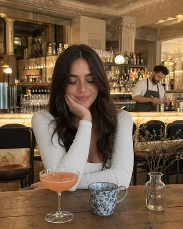 Example generated from “Woman at Elegant Bar Cafe Table”