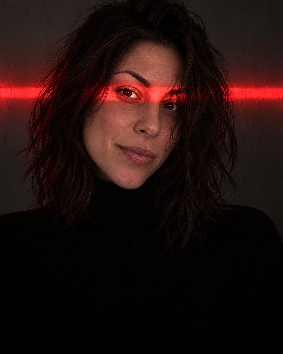 Example generated from “Dramatic Portrait with Red Light on Eyes”