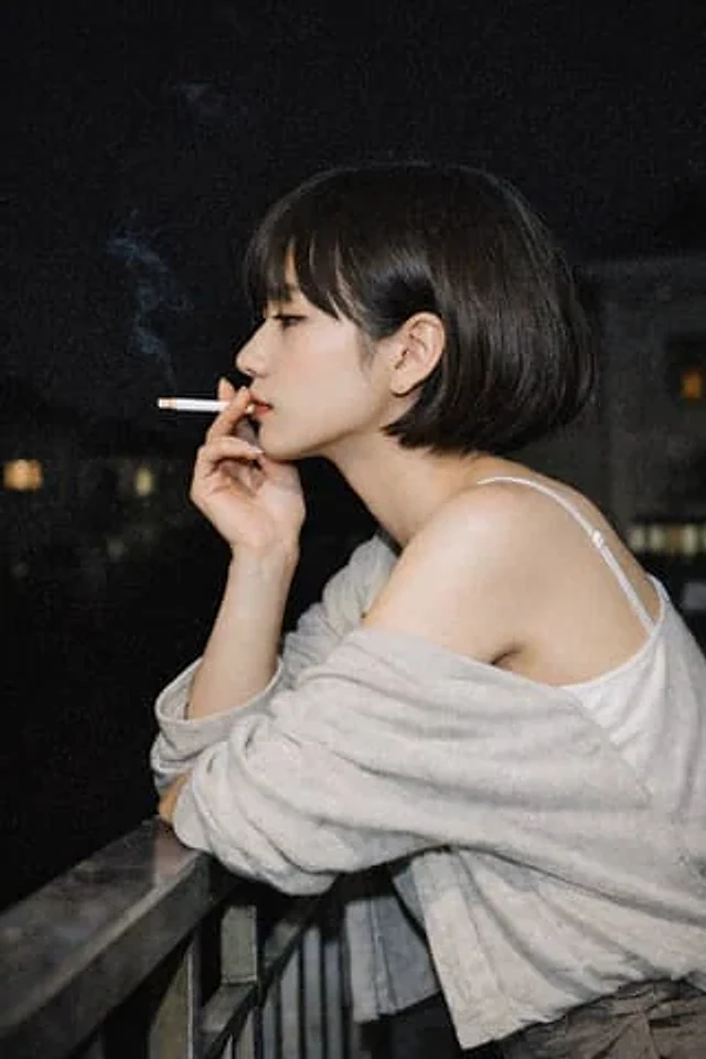Example generated from “Cinematic Night Portrait of a Woman Smoking”