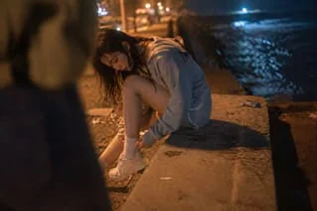 Example generated from “Cinematic Candid Night Seashore Portrait”