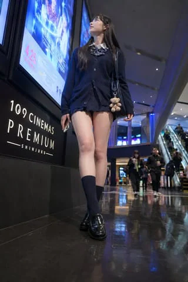 Example generated from “Cinema Lobby School-Inspired Fashion Photo”