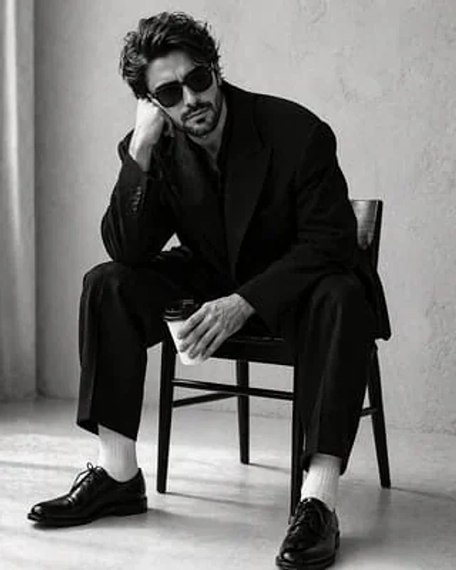 Example generated from “High-Contrast Monochrome Studio Portrait”