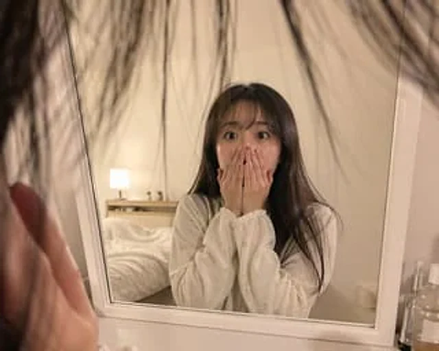 Example generated from “First-Person Mirror Bedroom Photo”