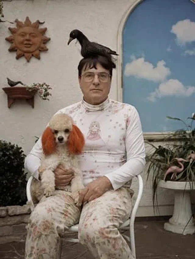 Example generated from “Surreal Patio Portrait with Crow and Dog”