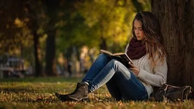 Example generated from “Autumn Park Reading Stock Photo”