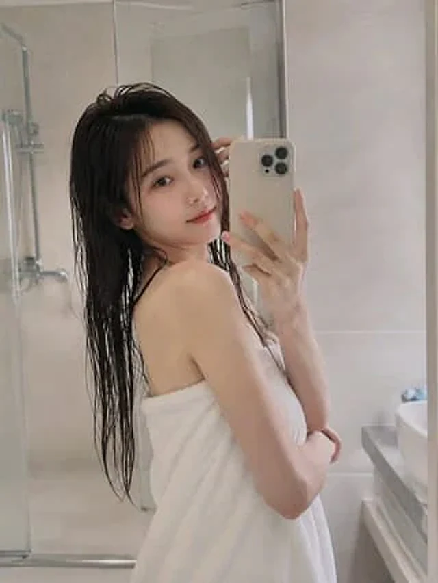 Example generated from “Realistic Bathroom Selfie Photography”