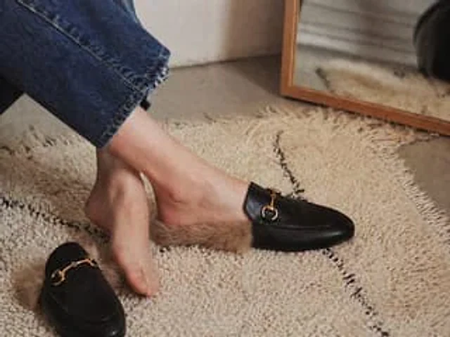 Example generated from “Luxury Fur-Lined Loafer Lifestyle Photo”