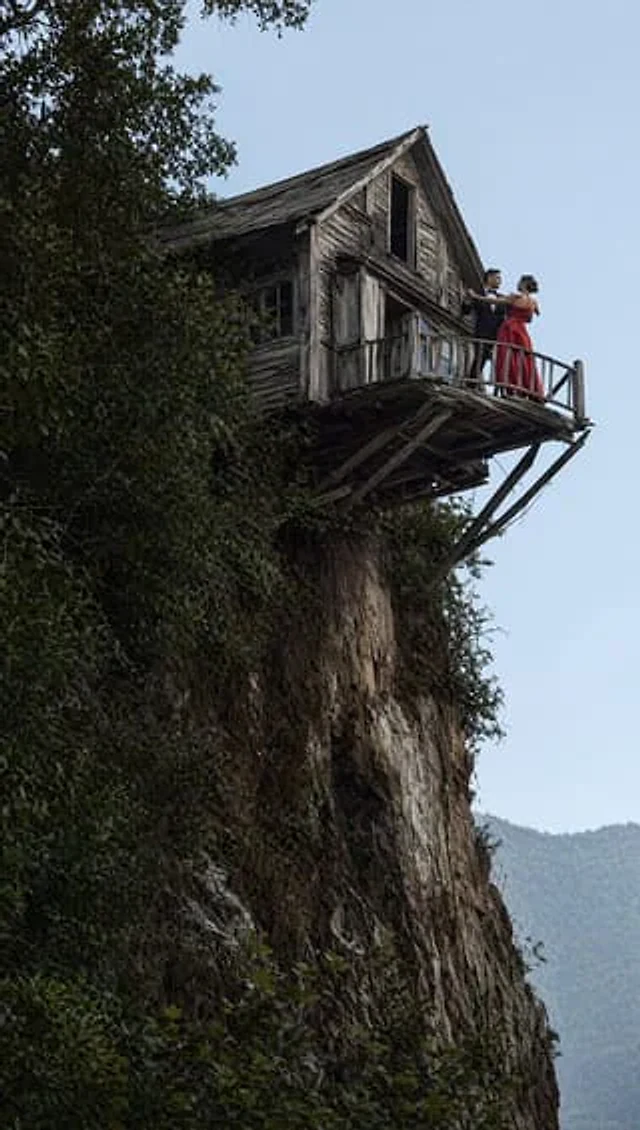 Example generated from “Dancing Couple on Cliffside House”